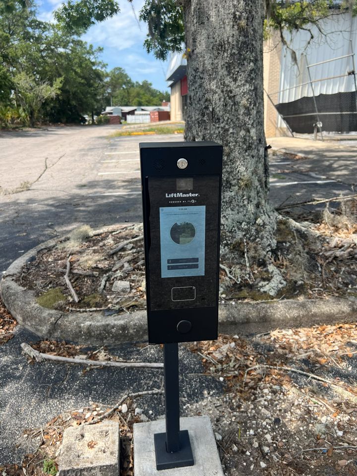 LiftMaster video and telephone entry unit mounted on a pedestal.